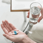 A person taking medication.