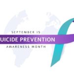 Purple and teal awareness ribbon with text that reads ‘September is Suicide Prevention Awareness Month’ on a light background.